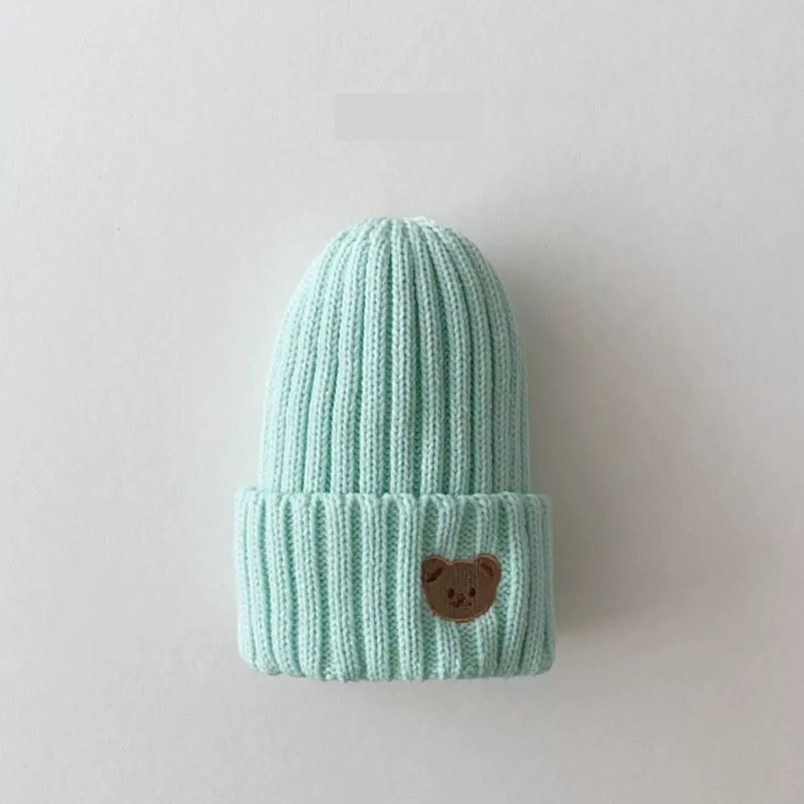 Unisex baby winter hat, knitted beanie style with a sweet bear embroidery, practical and fashionable.