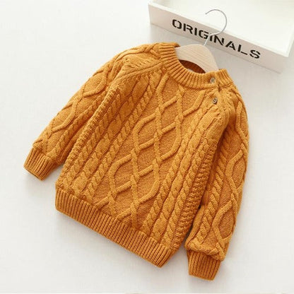 Toddler wearing a unisex knitted winter cardigan sweater, comfortable children's fashion outerwear