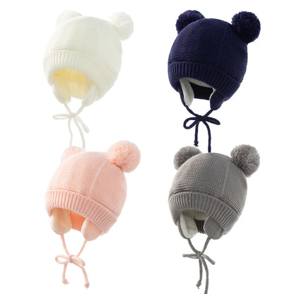 Unisex kids knitted winter hat with pompom and matching gloves set in blue, for cold weather