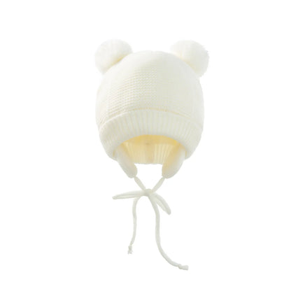 Unisex black knitted pompom hat and gloves set, stylish and warm for kids winter fashion
