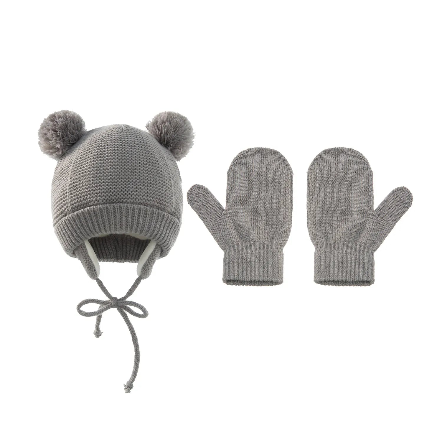 Various colors of unisex kids knitted pompom winter hat & gloves sets displayed together