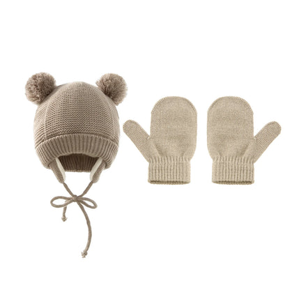 Handmade soft knitted pompom hat and gloves kit, a unique baby winter fashion accessory