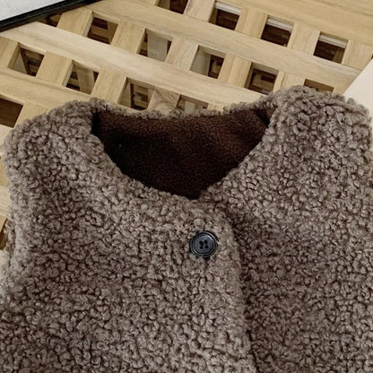 Kids lamb wool vest in a cozy indoor setting, perfect for autumn winter children's wear