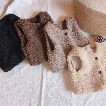 Close-up of fluffy lamb wool texture on a unisex kids vest, cozy autumn winter clothing