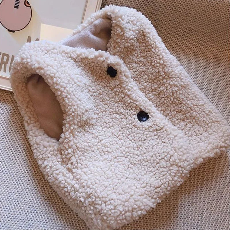 Lamb wool vest for children folded neatly, ready for winter baby clothing