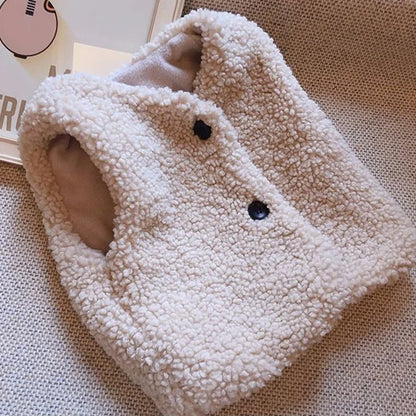 Lamb wool vest for children folded neatly, ready for winter baby clothing