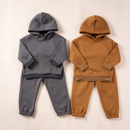 Unisex kids purple hooded tracksuit with elastic cuffs, ideal for winter comfort