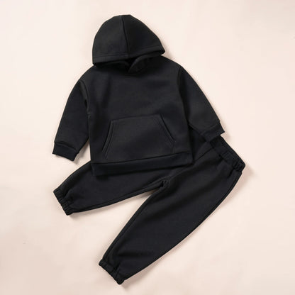 Kids winter clothing: unisex green hooded tracksuit set, perfect for outdoor activities