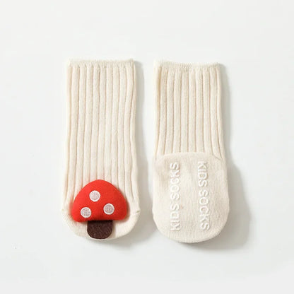Orange non-slip toddler socks with durable anti-skid dots, made from breathable cotton for comfortable safe play.