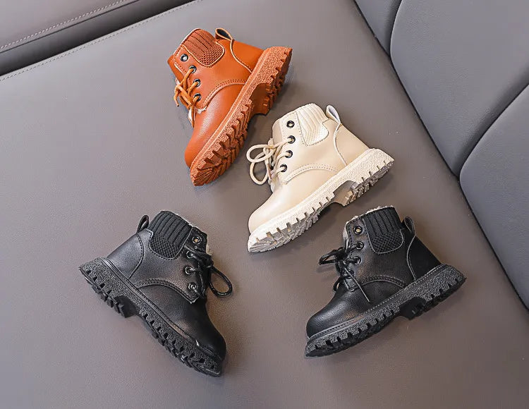 Front view of kids snow boots, waterproof exterior, plush-lined comfort
