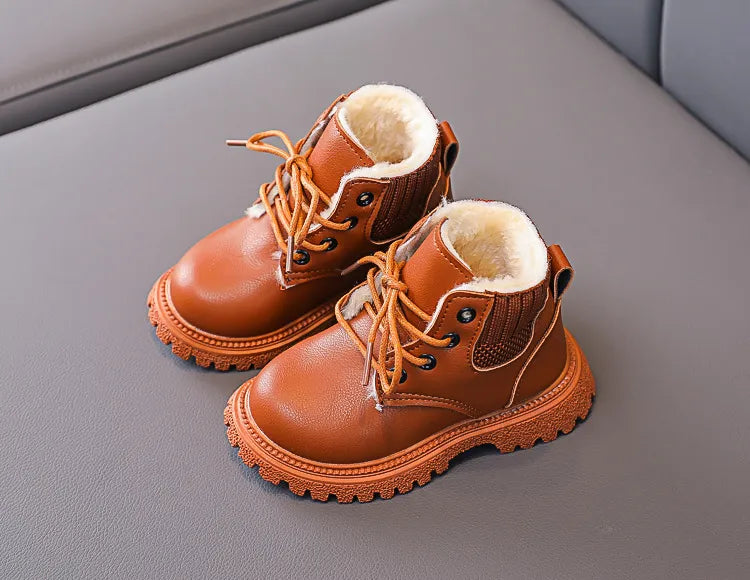 Close-up of plush lining inside unisex kids winter snow boots, soft texture