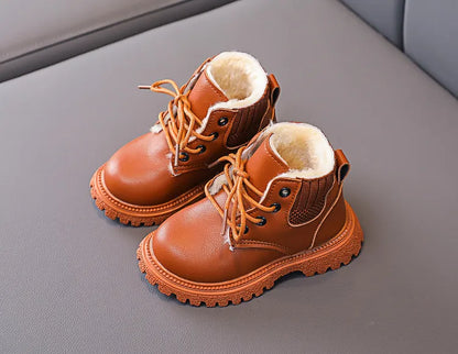 Close-up of plush lining inside unisex kids winter snow boots, soft texture