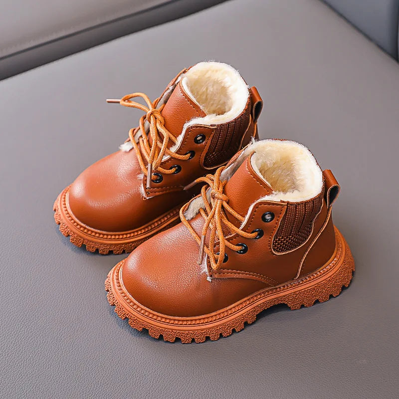 View of kids winter snow boots with adjustable velcro closure, plush comfort