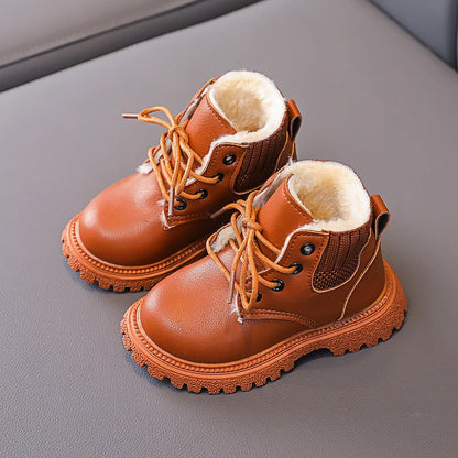 View of kids winter snow boots with adjustable velcro closure, plush comfort