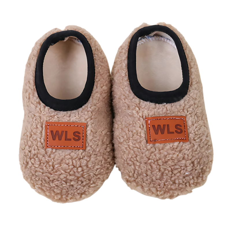 Unisex kids home slippers with a soft sole and plush feel, ideal warm footwear for children