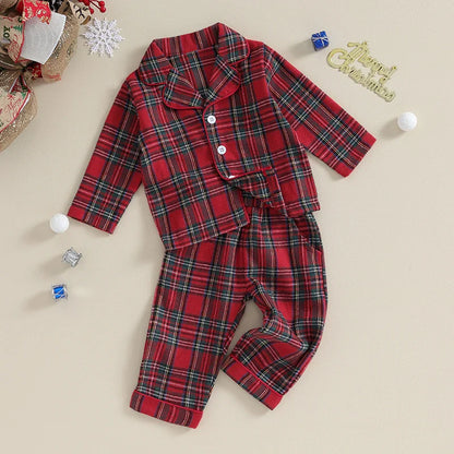 Close-up of soft flannel unisex kids plaid Christmas pajama top with buttons