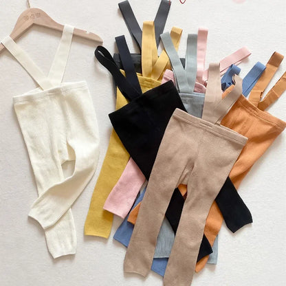 Unisex kids' soft cotton leggings with adjustable suspenders, perfect for active toddlers