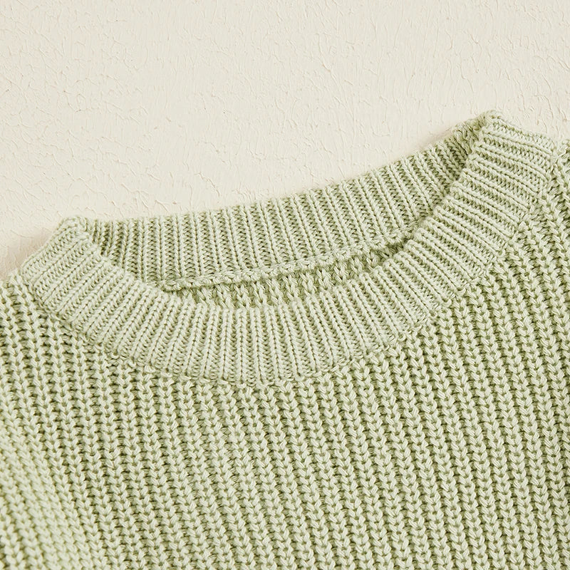 Soft knit cotton long sleeve sweater, a comfortable unisex winter wear for toddlers.