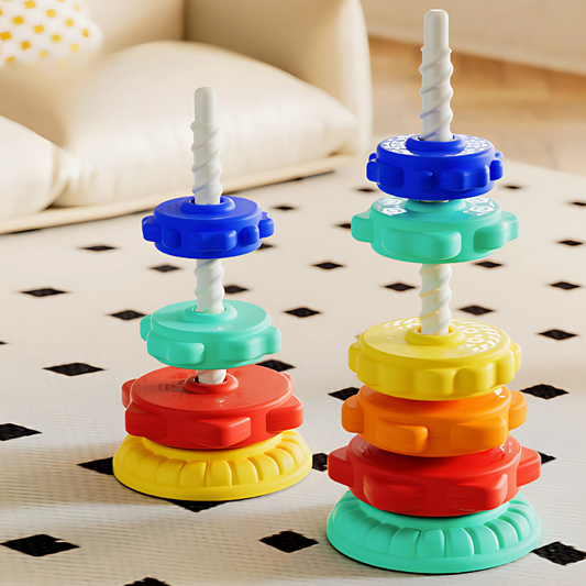 Unisex Kids Spinning Stacker Toy with rainbow rings, promoting motor skills development for toddlers