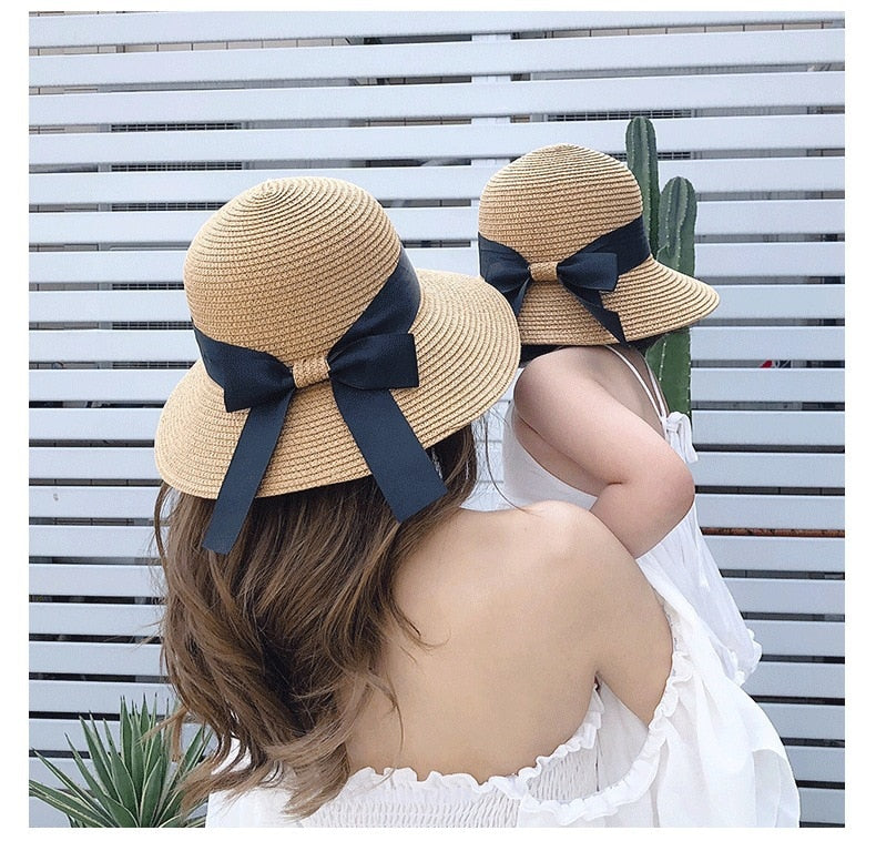 Adult & kids beige straw hats, sun protection for summer outdoor activities. Matching family vacation set.