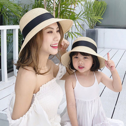 Unisex beige straw hats, perfect for kids & adults, offering sun protection during summer outdoor adventures.
