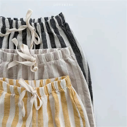 Close-up of striped pattern on unisex linen cotton blend pants for baby fashion