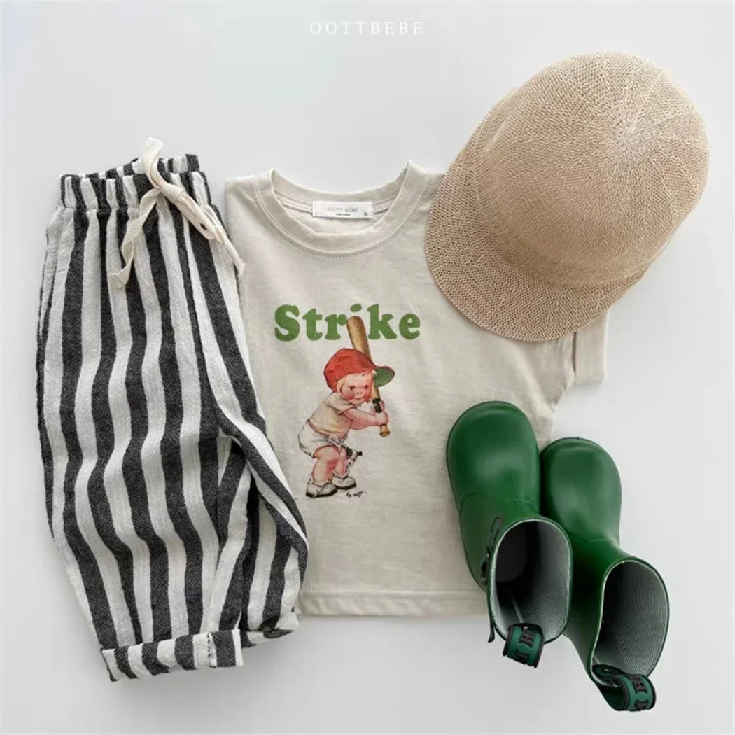 Toddler wearing striped linen cotton trousers, comfortable for casual wear and play