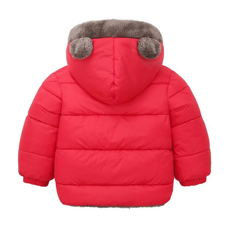 Close-up of the front pockets on a deepen hooded winter jacket, functional toddler outerwear