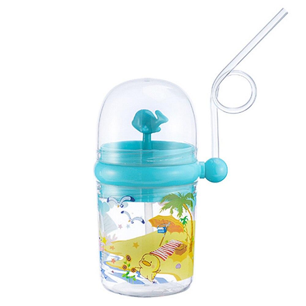 Vibrant blue whale spray water bottle for children, ensures playful hydration & easy clean-up