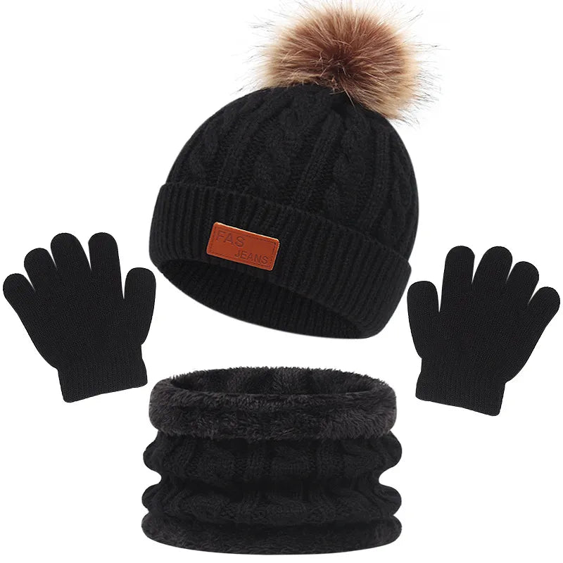 Children's winter gear: a durable and soft solid color beanie, scarf, and glove set.