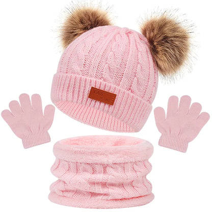 Infant cold weather protection: hat, scarf, and gloves set designed for comfort.