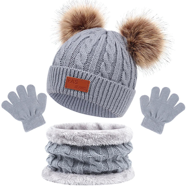 Baby accessories: a stylish and practical hat, scarf, and gloves set for winter.
