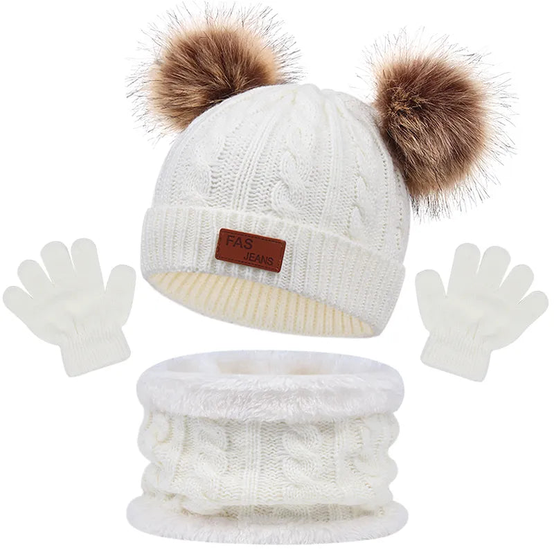 Toddler warm set; hat, scarf, and gloves in a classic solid knit, perfect for play.