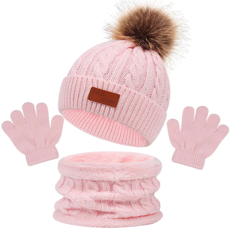 Unisex kids' beanie, scarf, and gloves set, featuring a ribbed knit design for warmth.