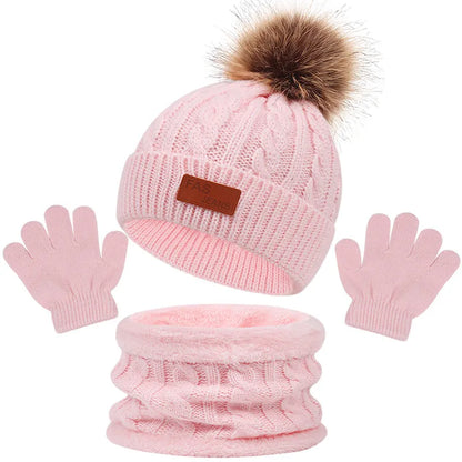 Unisex kids' beanie, scarf, and gloves set, featuring a ribbed knit design for warmth.