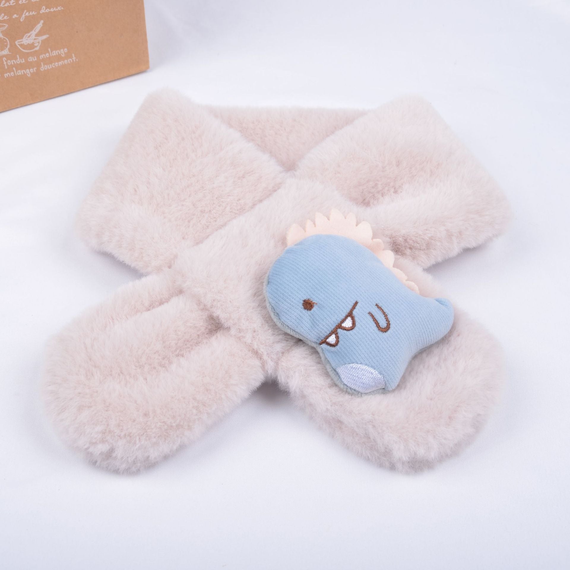 Sweet pink cartoon plush scarf for kids, a cuddly winter accessory for children's clothing