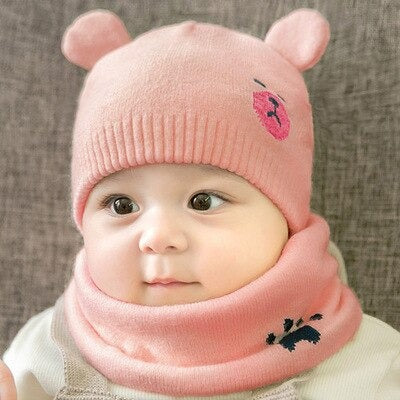 Unisex kids winter warm knitted cap and scarf set, gray with plush lining, on white background