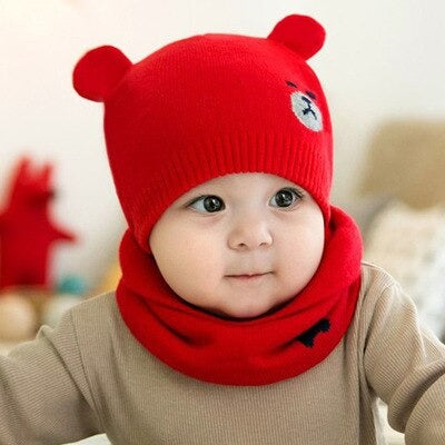 Winter wear for kids: Purple knitted cap and coordinating scarf set, ideal for cold weather