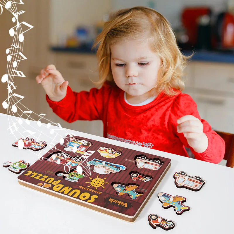 Educational kids puzzle board with colorful shapes and sound elements for preschool learning