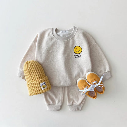 Unisex kids yellow smiley face cotton hoodie and pants set for comfortable toddler outfit