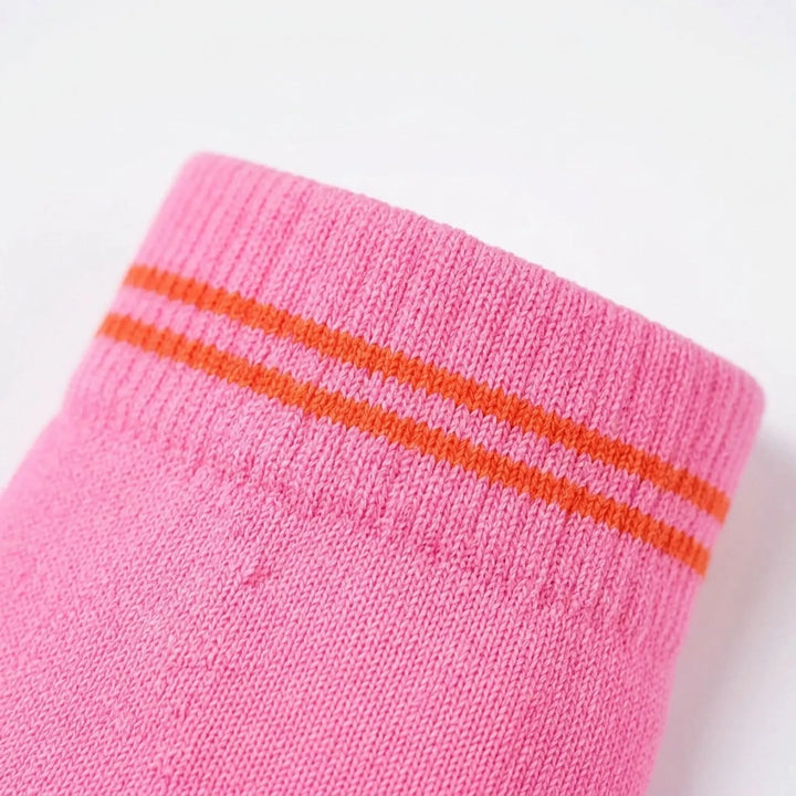 Performance unisex athletic socks providing essential leg support during intense exercise.