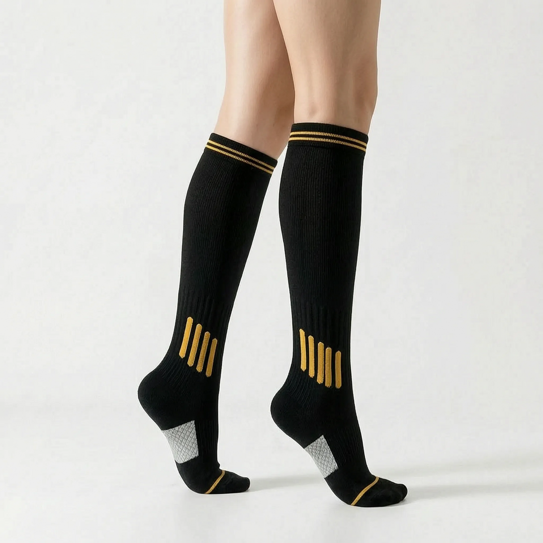Breathable white knee-high sports socks, unisex, designed for ultimate performance.