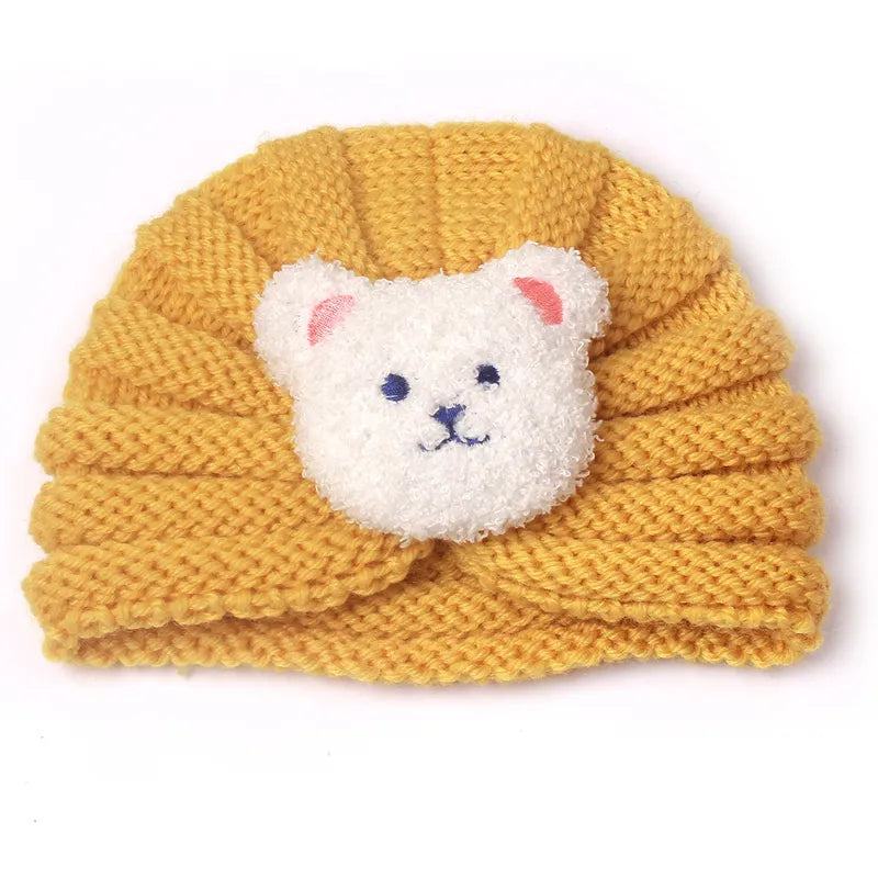 Close-up of the durable knit on a candy color baby beanie, long-lasting baby hat