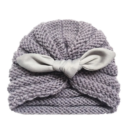 Detailed stitching of a quality knitted candy color baby hat, comfortable baby accessory