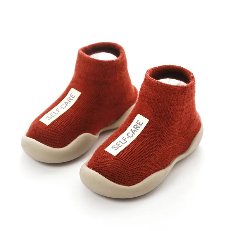 Unisex knitted baby first walker boots, ensuring stability for toddlers.