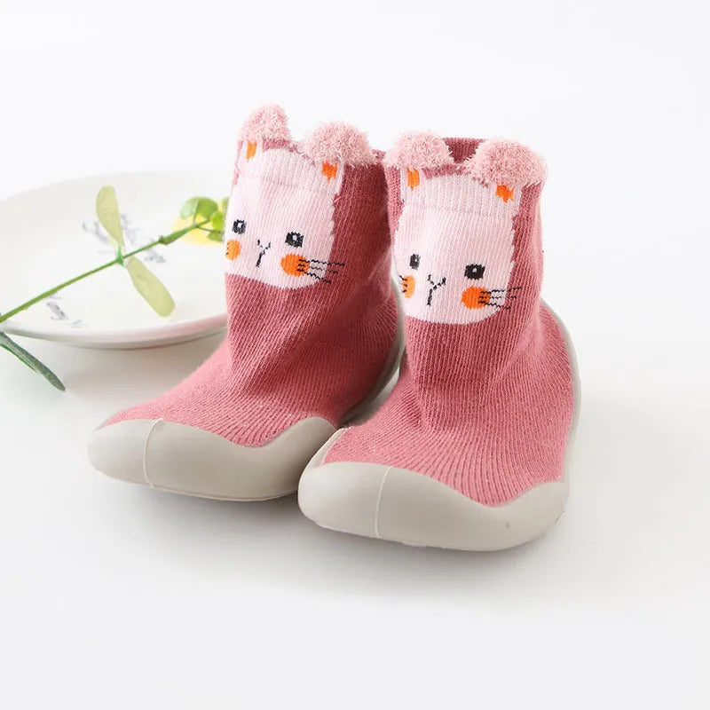 Front view of unisex non-slip knitted baby boots, comfortable infant wear.