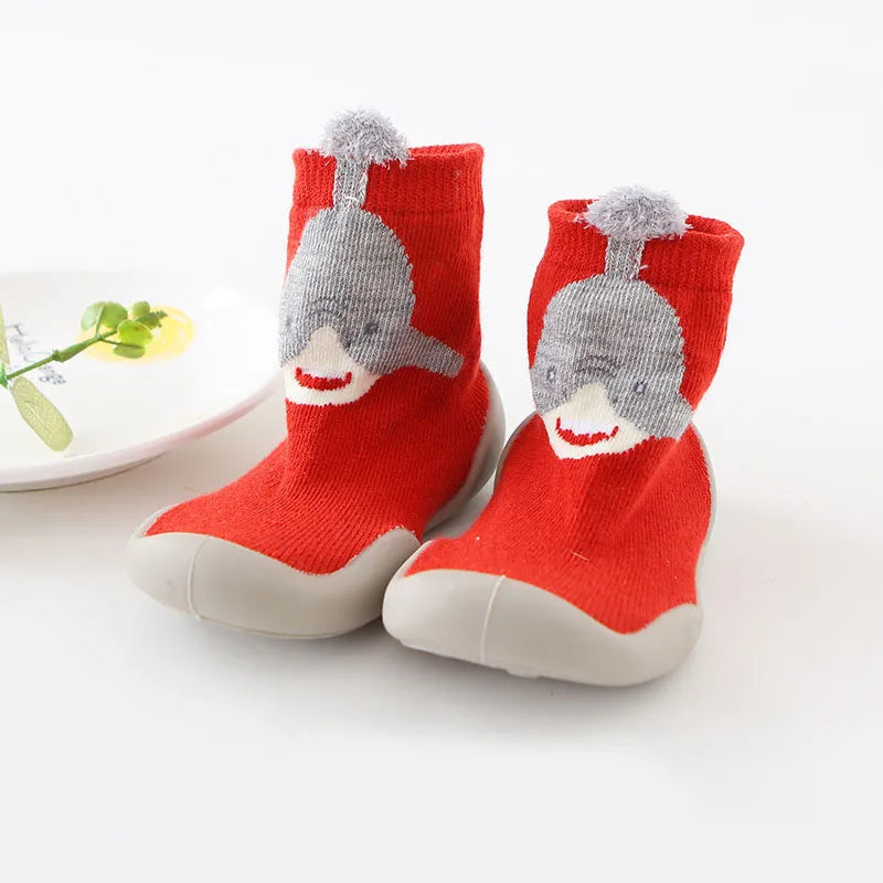 Side view of knitted baby first walker boots, showcasing non-slip features.