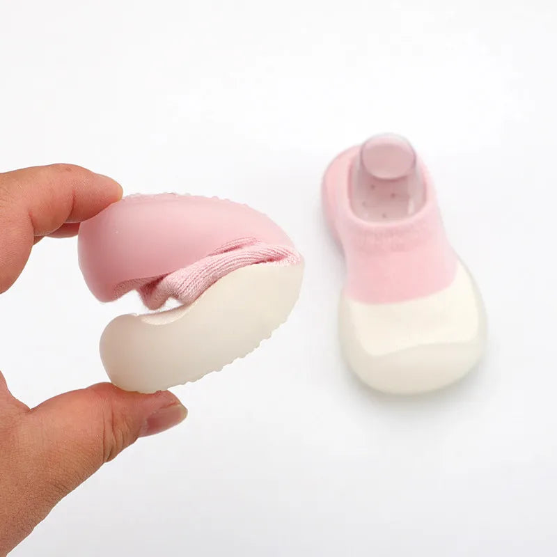 Adorable unisex baby knitted boots, ideal for infants learning to walk.