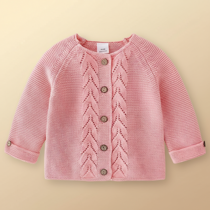 Unisex knitted cardigan for children, cozy warmth and soft texture.