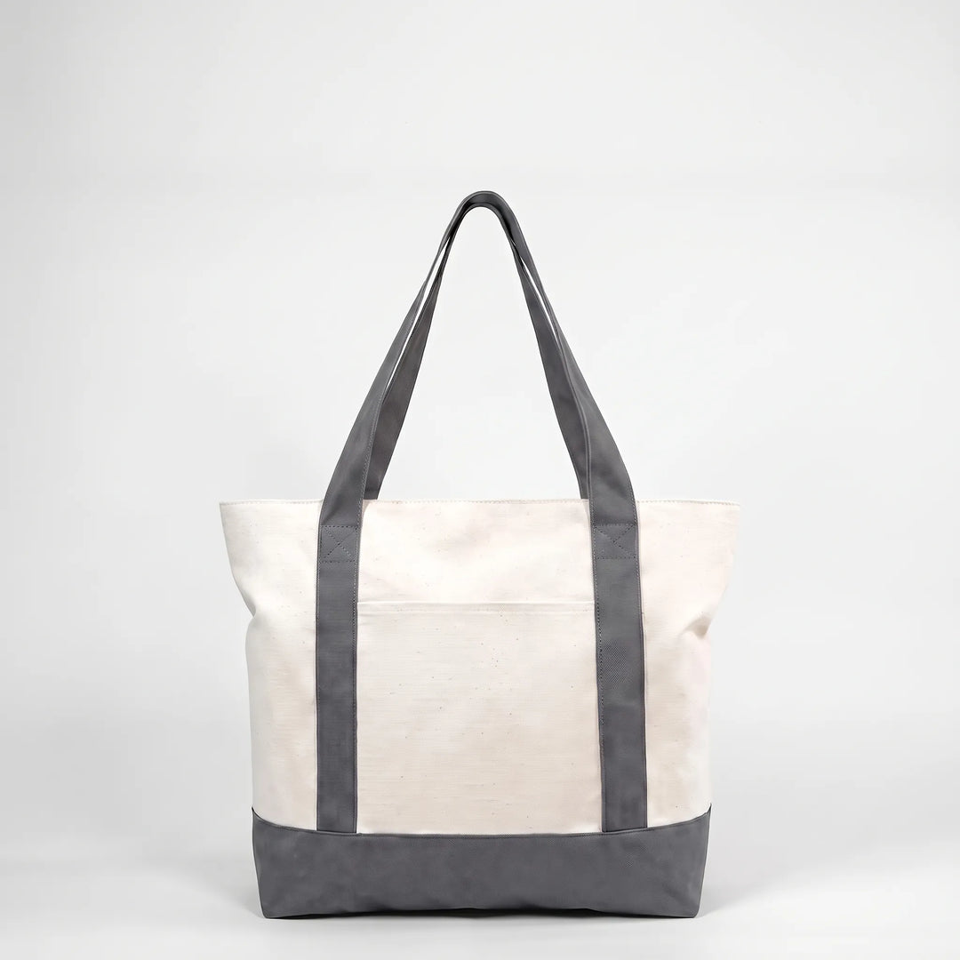 Spacious unisex zip shoulder tote, ideal for travel, gym, or groceries. Secure zipper closure.